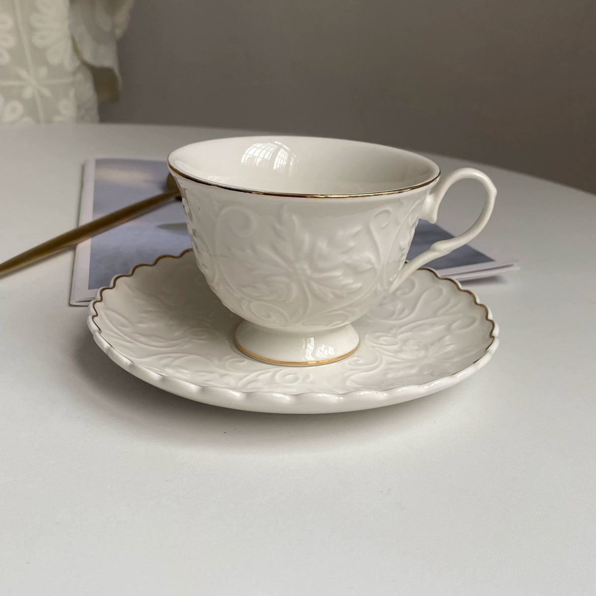 Raspberry Relief Cup and Saucer